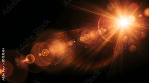 Warm orange lens flare overlay on black background