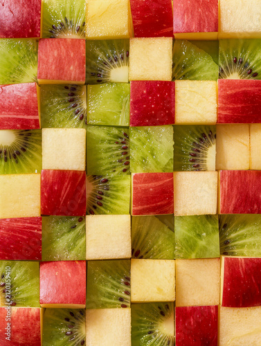 Checkerboard pattern of kiwi strawberry apple fruit cubes
