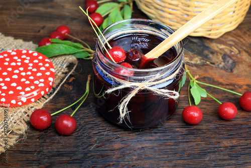 sour cherry jam in glass jar