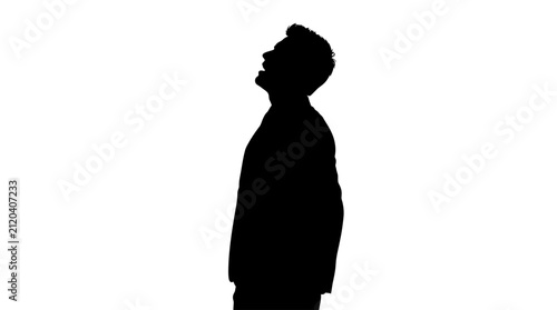 Quadro su tela Man looks upward in a contemplative pose suggesting hope or inspiration