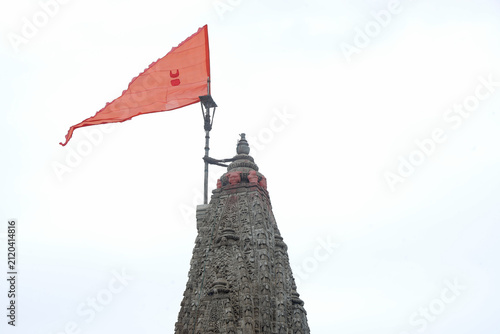 Majestic shikhara of Dwarkadhish Temple with religious flag in Dwarka, Gujarat