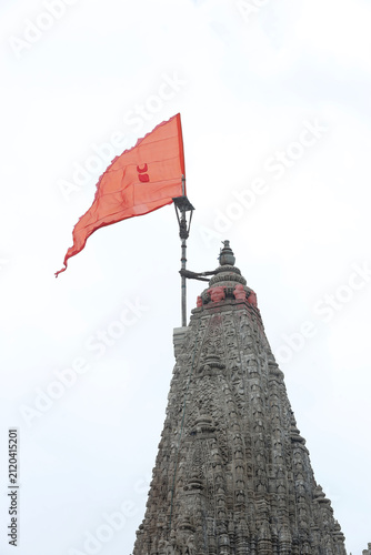 Majestic shikhara of Dwarkadhish Temple with religious flag in Dwarka, Gujarat