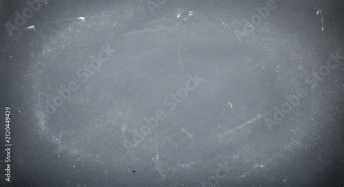 Dark grey chalkboard surface with subtle scratches and dust texture, vintage school blackboard background, for writing or projects
