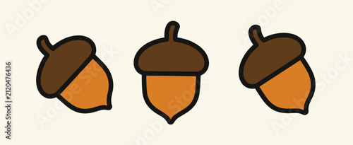 Three stylized acorn with brown caps and orange nuts, arranged in a row on a light beige background, flat