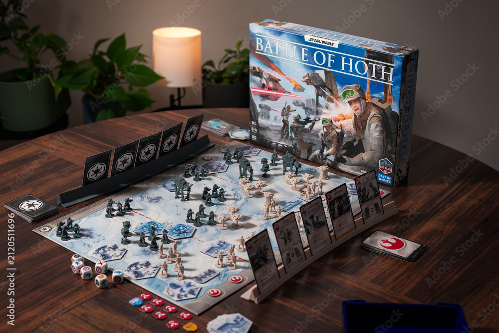 Fototapeta premium Portrait product photography of Star Wars Battle of Hoth board game with components and box displayed with dramatic lighting