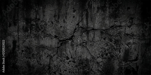 Abstract Dark Charcoal Cracked Concrete Background. Weathered industrial wall texture with rugged stone formations and distressed grunge surface. Dramatic backdrop for branding and editorial design