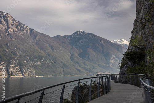 Scenic Cliffside Walking Path Along Lake Garda with Mountain Views, Italy