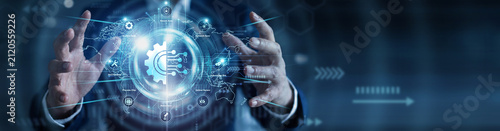 Industrial control. Process engineer holding glowing automation controls over a global network on an abstract dark background. Workflow efficiency and robotics.