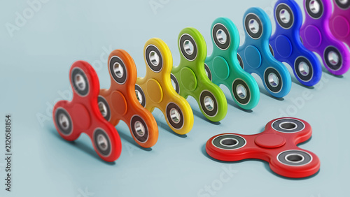 Cuadro en lienzo Fidget spinners isolated on blue background. 3D illustration