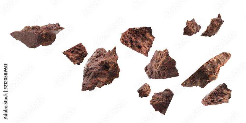 Fototapeta premium Tasty chocolate. Pieces flying in air on white background