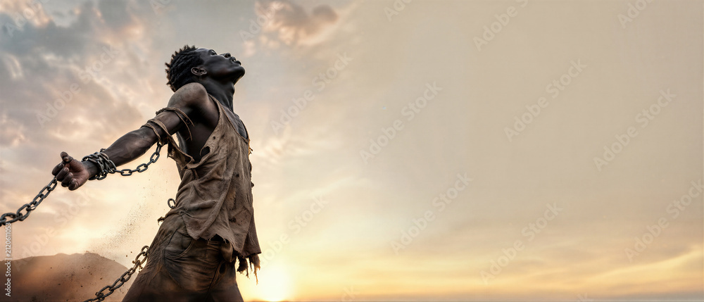 Fototapeta premium African man breaking metal chains in struggle for freedom. Symbolic representation of liberation slavery and resistance. Banner with copy space