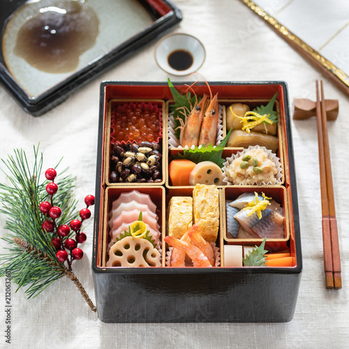 Traditional Japanese New Year osechi food arranged in lacquered jubako box