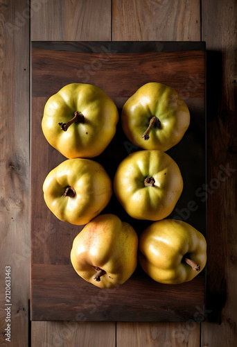 Six fresh yellow quinces ar...