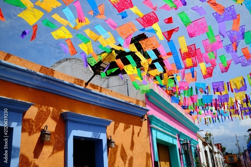 Multicolored Papel Picado Banners Framing Vibrant Street Facades (Oaxaca de Juarez, Oaxaca, Mexico)