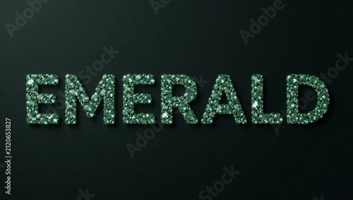 Black background word emerald written capital letters made small green crystals arranged way form each letter