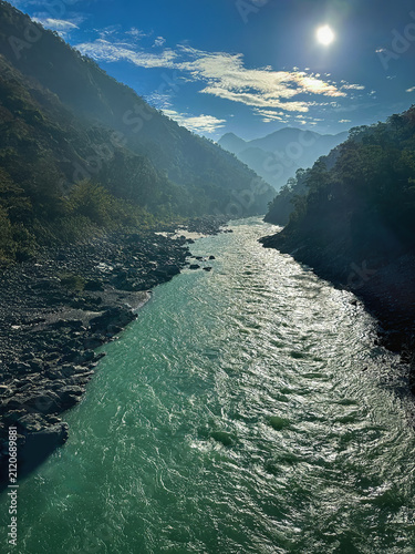 Ganges River Flowing Through Rishikesh with Himalayan Mountains, Uttarakhand, India