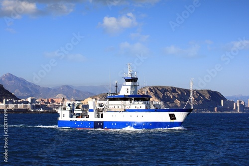Принти на полотні Trauler fishing boat sailing along the Mediterranean coast of Spain