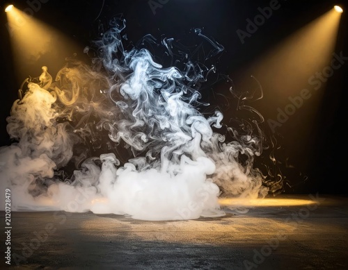 Dense white smoke clouds lit by studio spotlights.