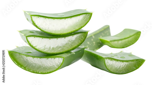 Aloe vera plant leaves are sliced into thick, succulent pieces to reveal the clear, soothing gel inside which is commonly used in skincare products, natural medicinal remedies, and beauty treatments.