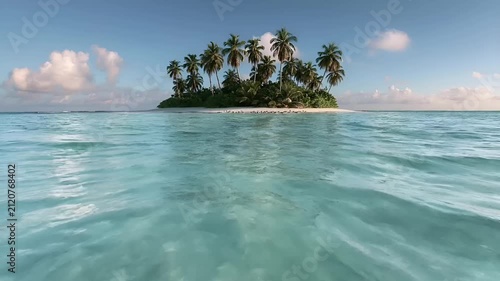 Summer hot vibe lifestyle. A vivid portrayal of a tropical paradise. A pristine white sandy island is the central focus, surrounded by crystal clear turquoise waters. Tall.