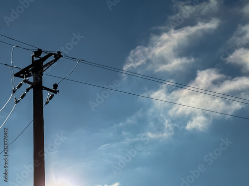 Canvastavla Wooden power pole with electrical wires against blue sky