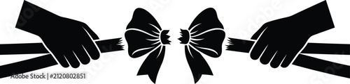 Fotografie Black silhouette of hands pulling and tearing apart a wrapped ribbon bow on whit