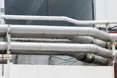 Fotografía Industrial ventilation pipes mounted on building facade