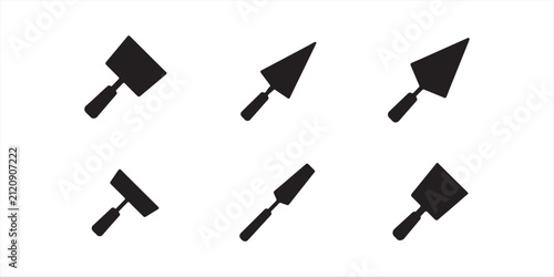 Collection of six black silhouette icons of masonry tools including plastering and pointing trowels showing different shapes and construction design variations