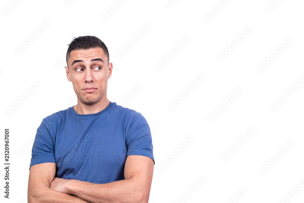 Obraz premium Man with his arms crossed looking aside with distrust