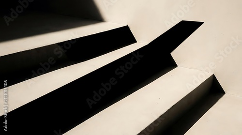 Abstract geometric shapes with contrasting light and shadow interplay