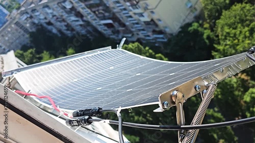 Flexible Solar Panel Mounted Outside High-Rise Apartment Balcony for Urban Renewable Energy