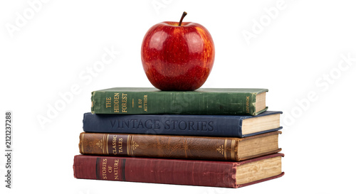 Obraz na płótnie Stack of antique books topped with a ripe red apple, symbolizing knowledge