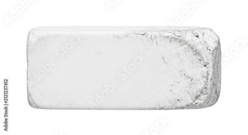 Photography Well-used white eraser with textured edges on a clean white background
