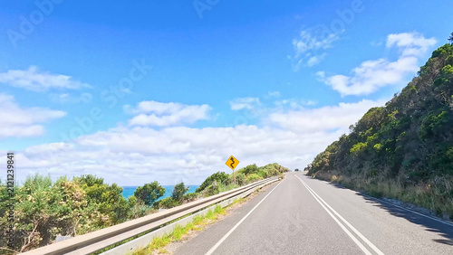 Fotografie Scenic Coastal Drive Along the Great Ocean Road in Australia