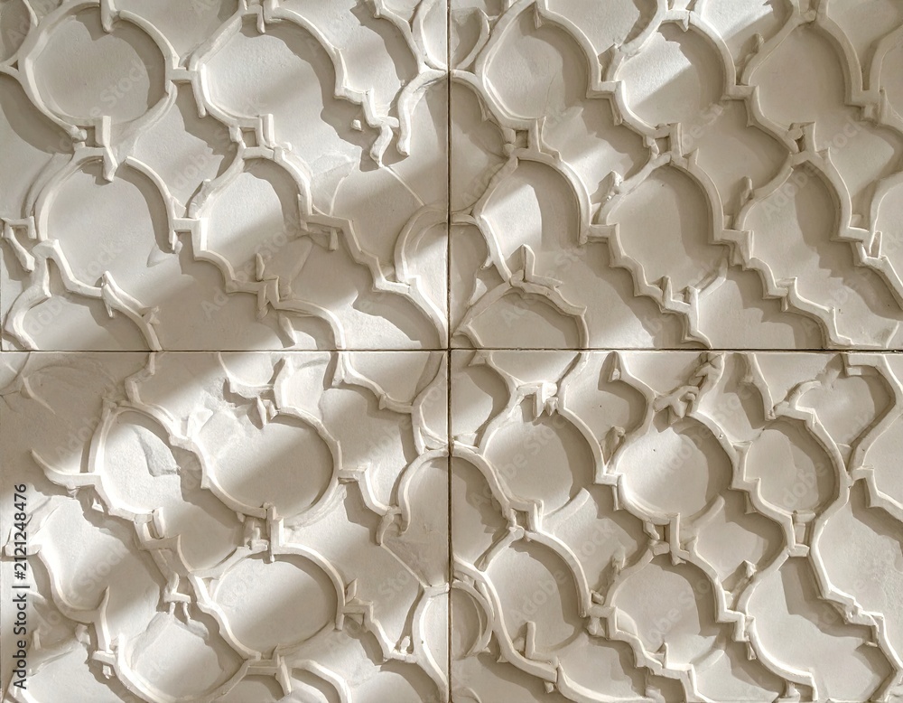Obraz premium Textured Beige Geometric Tiles with Repeating Pattern