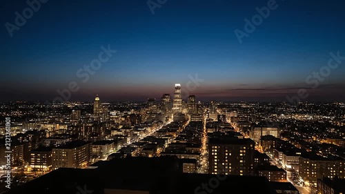 Beautiful city skyline sunset time lapse cinematic aerial view of glowing urban skyscrapers streets night lights downtown architecture cityscape background stock video footage for production presentat