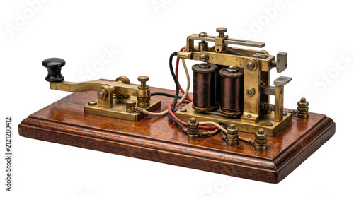 Vintage telegraph machine with brass components, antique morse code transmitter on wooden base, retro telecommunication equipment isolated on white