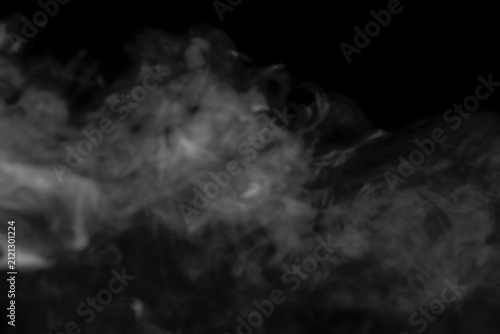Bild auf Leinwand Dramatic Smoke Swirls on Black Background for Creative Design Needs