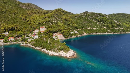 Aerial view of Sobra bay on Mljet island, crystal clear turquoise Adriatic sea in Croatia. Crystal blue sea surrounding Sobra bay on Mljet island. Coastline of Mljet island in Croatia
