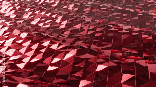 Abstract red metallic polygonal surface wave animation. Seamless looping 3D low poly background video for motion graphics, VJ loops, concert visuals, and technology concepts.