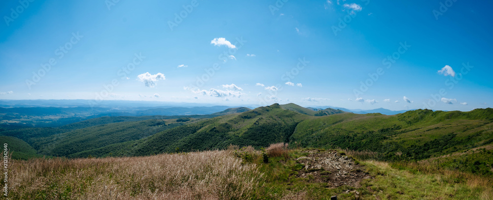 Fotografie Panoramic landscape with mountains and clouds