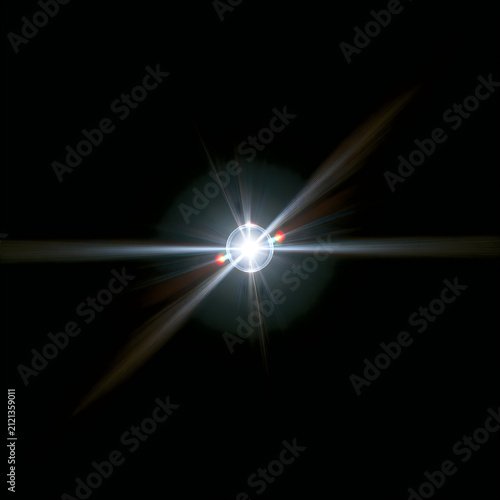 Bright lens flare with light rays and glowing center isolated on black background for overlay effect