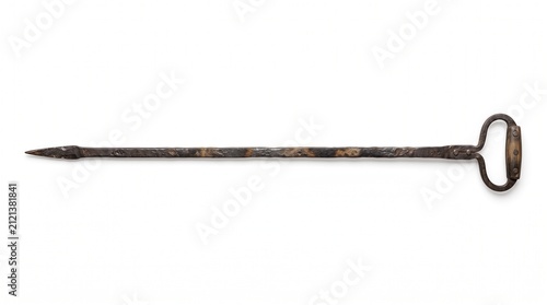 Bild auf Leinwand Old rusty metal poker tool for fireplace