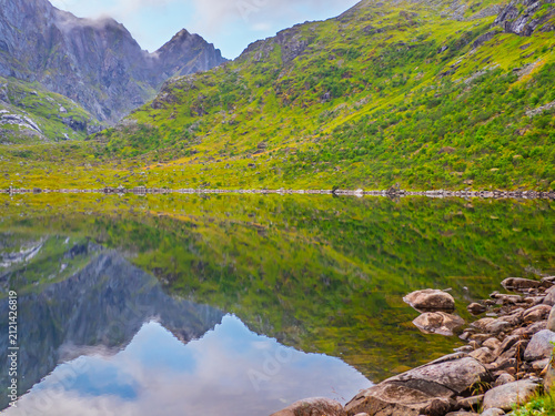 View on the lake Markvatnet from the trail to the Kvalvika Beach. Markvatnet is a pond situated nearby to the hamlet Krystad and the locality Selfjord. Norway, Nordland, Northern Europe