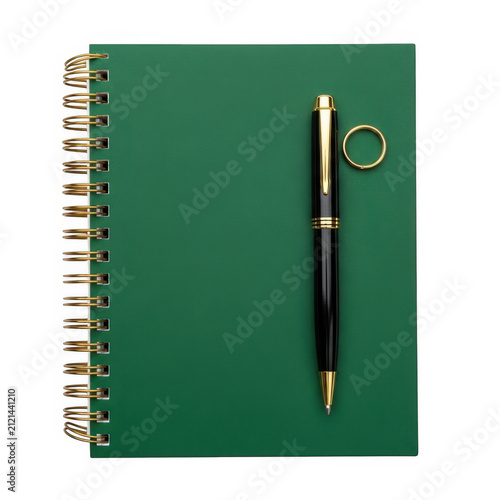 Green spiral notebook with pen on top