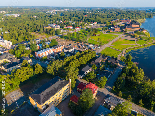 Hämeenlinna city main castle park and Vanaja shore from air in Finland early morning. 