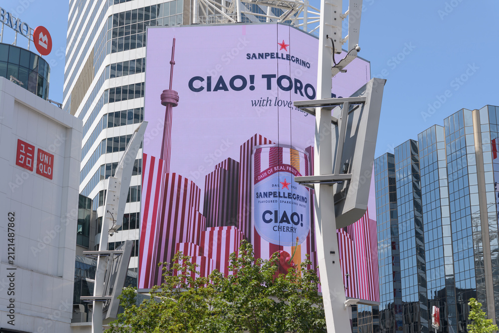 Fototapeta premium digital billboard at Sankofa Square featuring ad for Sanpellegrino CIAO! cherry flavored sparkling water, Toronto