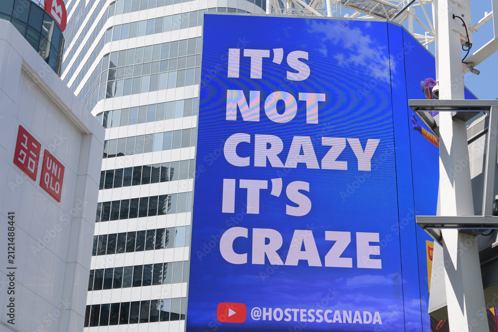 Fototapeta premium text advertising copy of Craze line of snack cakes by Hostess Canada, on display at Sankofa Square, Toronto