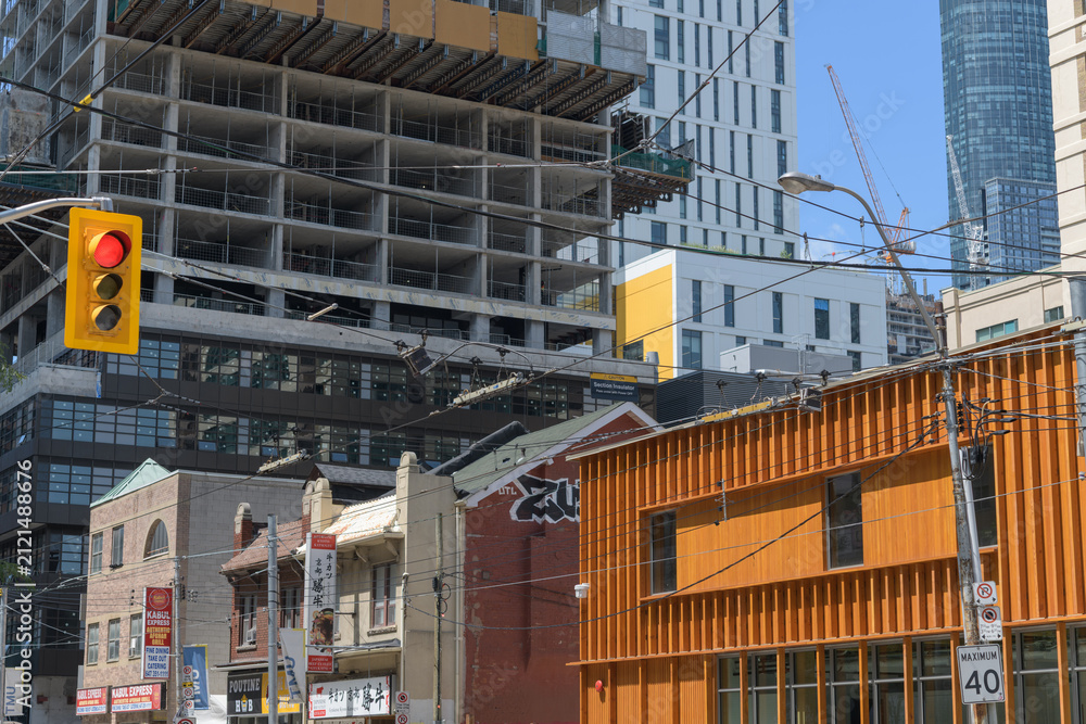 Fototapeta premium looking west on Dundas St E near Mutual and Bond street, north side, site of TMU and condominium development, Toronto