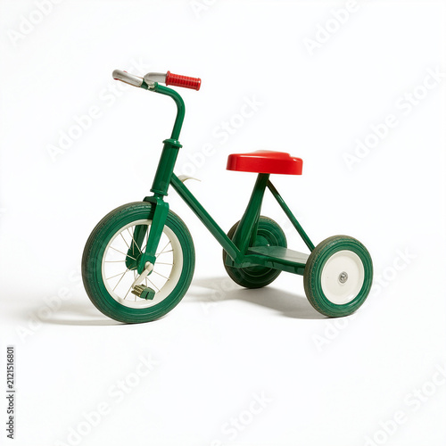 Dark green vintage trike - tricycle for kids isolated on white background